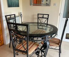 Wrough iron table and 4 chairs