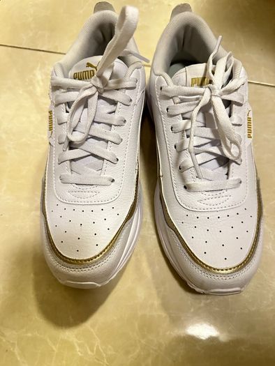 Puma white trainers