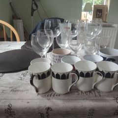 assorted drinking glasses, cups mugs.