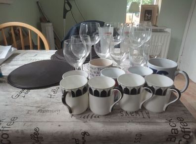 assorted drinking glasses, cups mugs.
