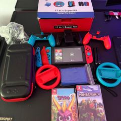 Nintendo Switch with game collection