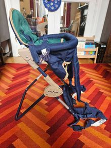 Backpack baby carrier and high chair