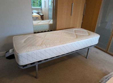 Small single bed frame with mattress