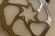 Disc brake rotor with screws