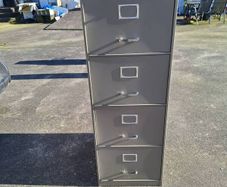 Four drawer metal filing cabinet with key
