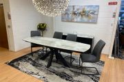Extending dining table and 6 chairs