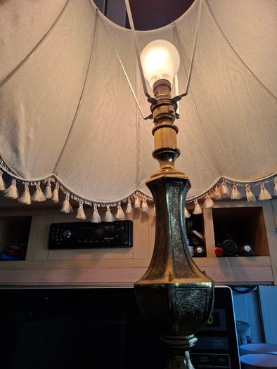 A Beautiful Large Heavy Victorian-style Brass Table Lamp with Brass Baluster Stem and Faceted, Paneled Knop, raised on a Stepped Hexagonal Base; fitted with a tall, cream textile shade with scalloped fringe and tassel trim, Postage Available or collection