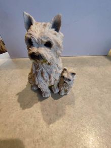 Care in terrier figurine hand made and painted.
