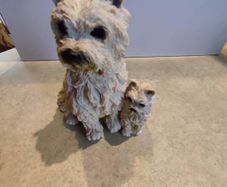 Care in terrier figurine hand made and painted.