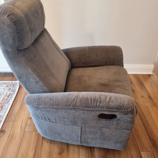 Swivel rocker reclining armchair
