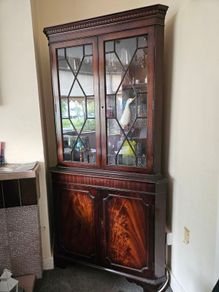Antique corner glass cabinet