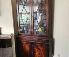 Antique corner glass cabinet