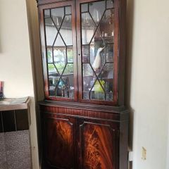 Antique corner glass cabinet