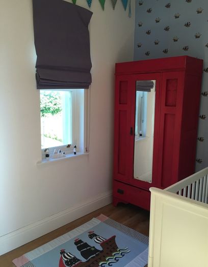 Antique wardrobe painted red