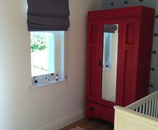 Antique wardrobe painted red