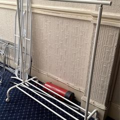 Clothes hanging rack with bench