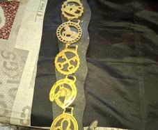 Set of Five Old Brass Horse Medallions on a black strap, Postage Available,