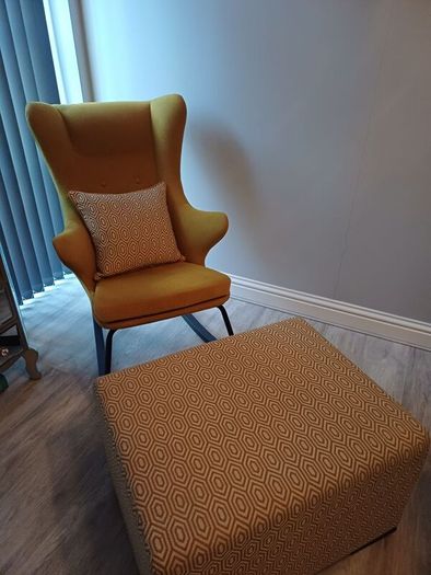 Rocking accent chair designer Kare with matching foot stool