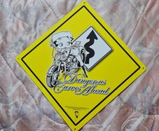 Vintage 2005 betty boop dangerous curves ahead metal sign 42x42 yellow in excellent condition