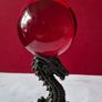 Red crystal/glass ball and metal dragon stand. Image 4