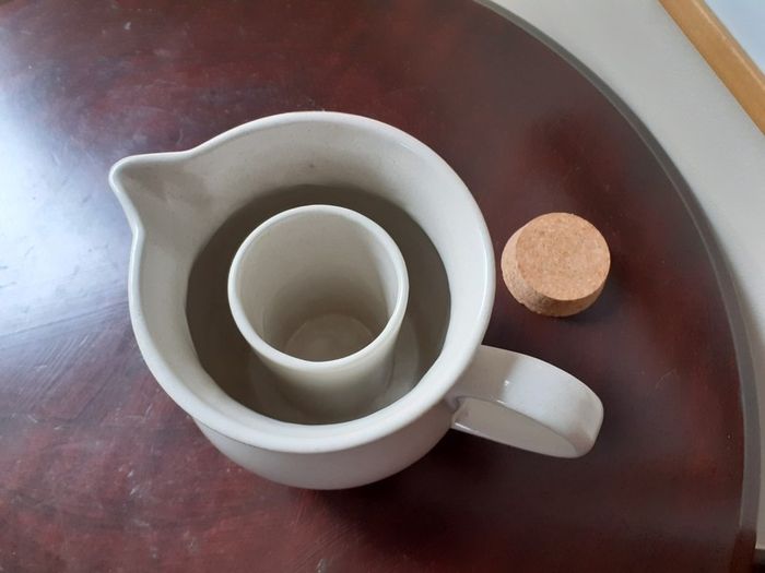 Pottery Pitcher with Ice Section