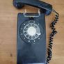 Wall Mounted P&T Black phone. Image 2