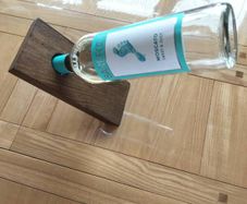 Floating wooden wine holder