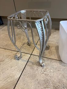 Silver metal square shape plant stand with matching white plastic pot