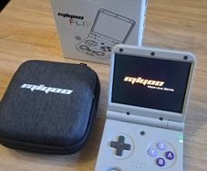 Miyoo Flip handheld retro games console - boxed with case