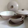 Pair of Vintage Poole Pottery Twintone Lidded Serving Dishes and a Matching Gravy Boat and Underplate, All in Colourway C54, Sepia and Mushroom and in the Older Streamline Shape, circa 1952-55 Image 3