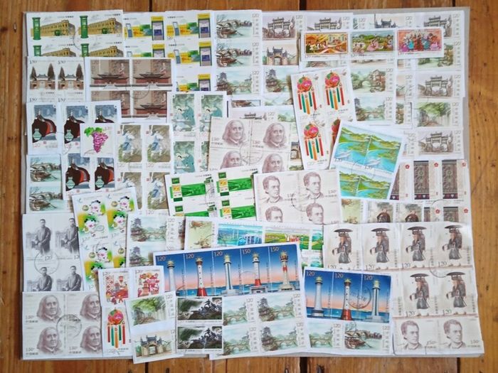 Stamps - A collection of 329 colourful Chinese stamps.