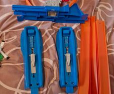 Hotwheels cars and track with loop. Plus bikes and playmat
