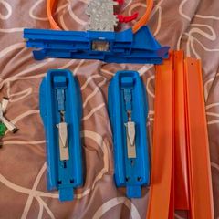 Hotwheels cars and track with loop. Plus bikes and playmat