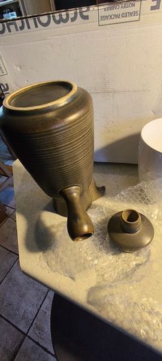 2 different itemes- 1-1960s Langley Sherwood Coffee Pot but stmpe been gone 60.00 euro.2- Ceramic Plant pot or vase 628/14 Made In Germany. 18.00 euro.