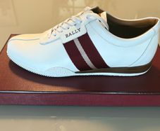 Bally Frenz white perforated leather trainers. Brand new and unused. Retailed at more than five hundred euro new. Original box, dust bag, packing paper and Bally bar code. Bargain!