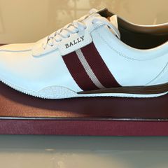 Bally Frenz white perforated leather trainers. Brand new and unused. Retailed at more than five hundred euro new. Original box, dust bag, packing paper and Bally bar code. Bargain!