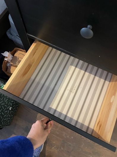Black five-drawer chest of drawers