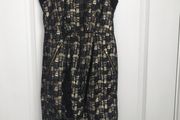 Black and gold mini dress