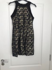 Black and gold mini dress