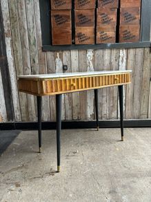 console table with marble top and brass detail