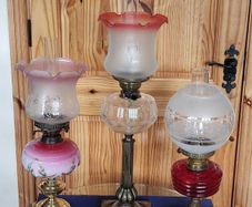 Antique oil lamps in very good condition. 365 each