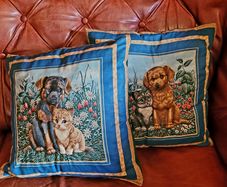 Vintage pair of handmade cushions