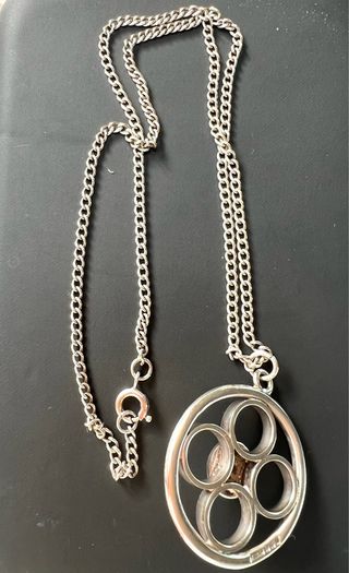 Sterling silver necklace with four -leaf floral pendant