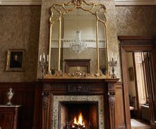 Very nice aa very old gilt framed mirror.