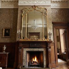 Very nice aa very old gilt framed mirror.