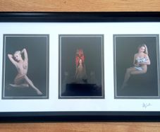 Framed art nude photos.