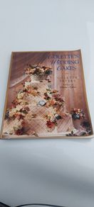 Colette Peters signed cake book ,wedding cakes  ,,sold as seen ,buyer collects or pays postage thank you.