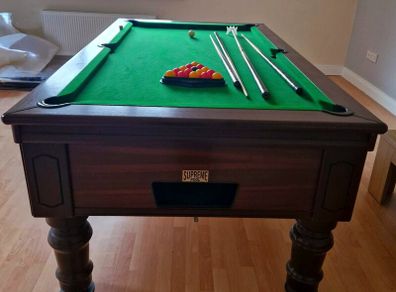 supreme prince 7x4 pool table,  just covered
