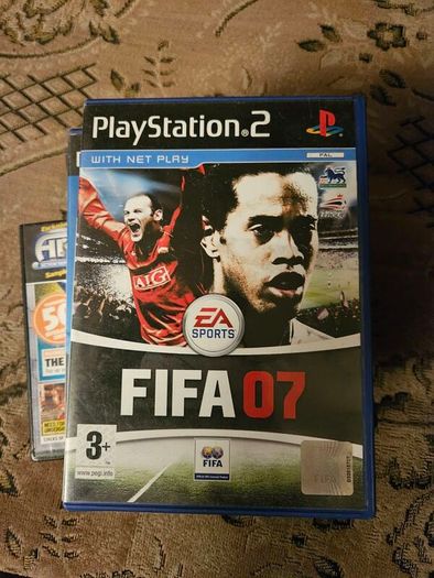 PlayStation 2 with games
