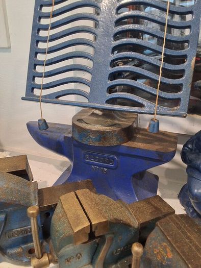 anvil on timber stand